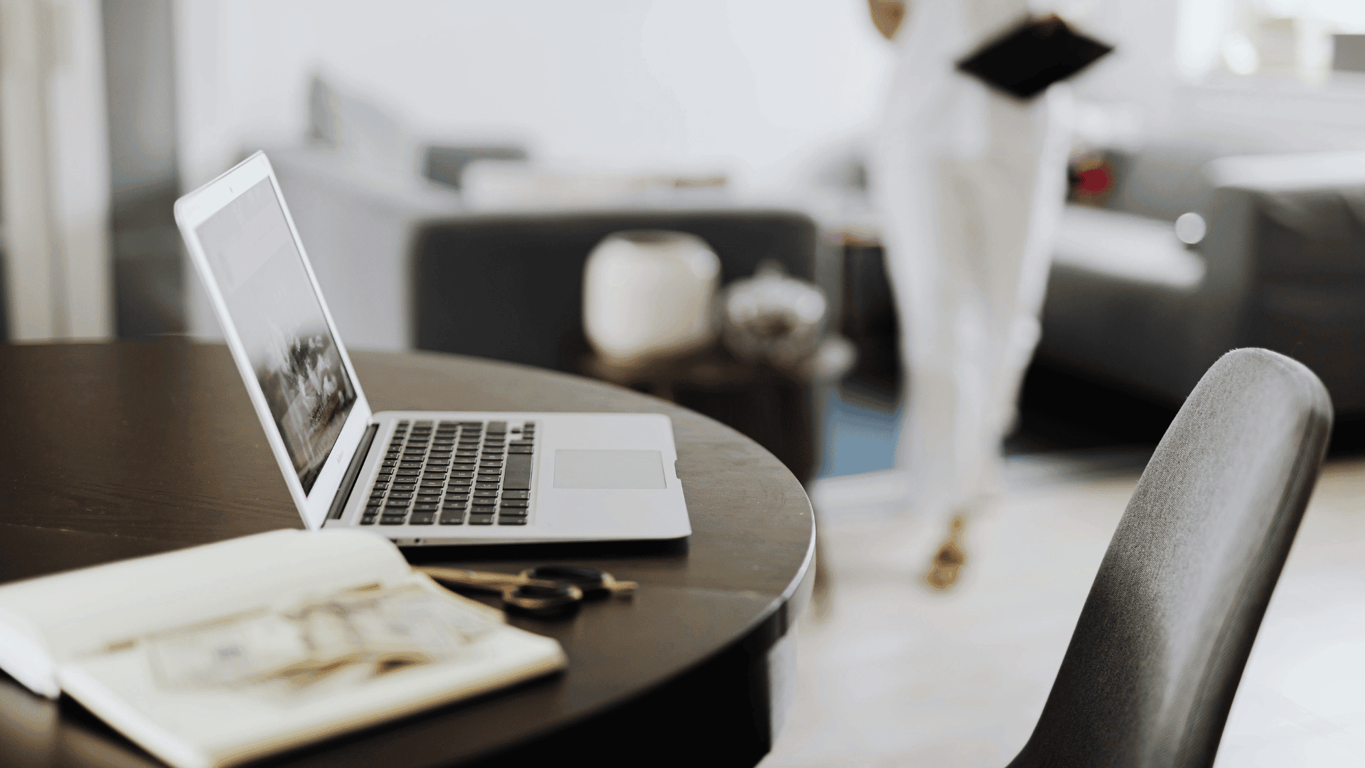 Laptop on a wooden desk representing employment process and job recruitment.